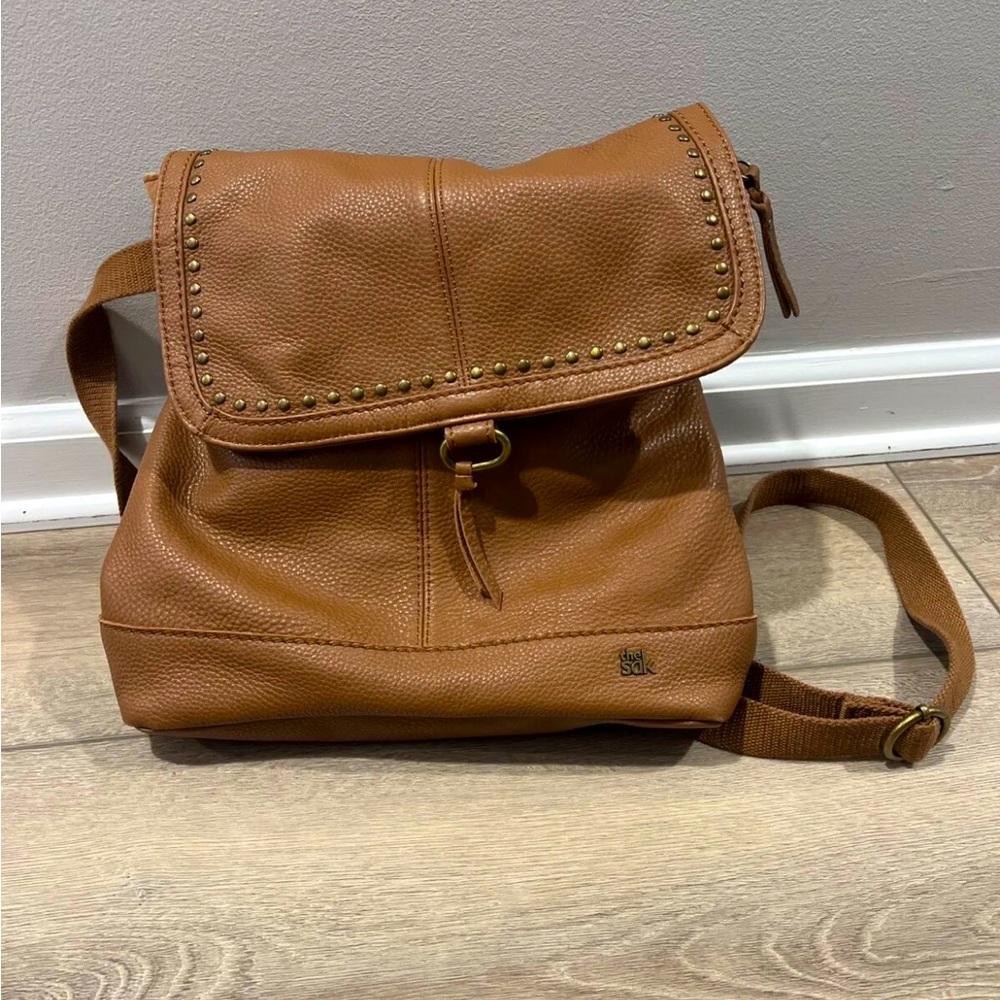 The Sak brand tan Leather backpack